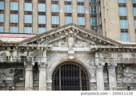 DETROIT, MICHIGAN, UNITED STATES - MAY 5th 2018: A view of the old Michigan Central Station building in Detroit which served as a major railway depot from 1914 - 1988 DETROIT, MICHIGAN, UNITED STATES - MAY 5th 2018: A view of the old Michigan Central Station building in Detroit which served as a major railway depot from 1914 - 1988 105611138