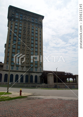 DETROIT, MICHIGAN, UNITED STATES - MAY 5th 2018: A view of the old Michigan Central Station building in Detroit which served as a major railway depot from 1914 - 1988 105611145