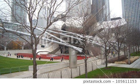 CHICAGO, ILLINOIS, UNITED STATES - Dec 12, 2015: View of the Jay Pritzker Pavilion in downtown Chicago on an drizzly winter day CHICAGO, ILLINOIS, UNITED STATES - Dec 12, 2015: View of the Jay Pritzker Pavilion in downtown Chicago on an drizzly winter day 105611153