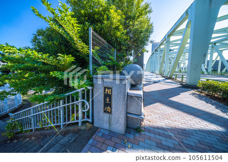 Tokyo cityscape in Japan The entrance to Koto Ward's Nakanoshima Park at the base of Aioi Bridge (left side of the screen), etc. 105611504