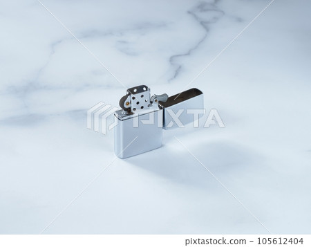 Zippo. Marble background. Zippo. Marble background. 105612404