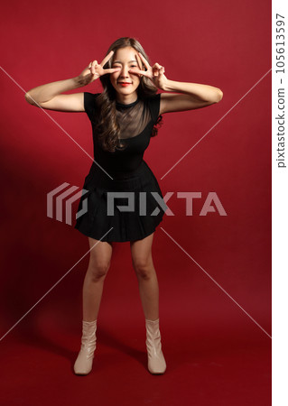 Woman in Red 105613597