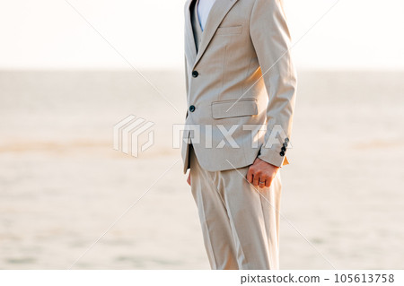 Image of the pre-shoot at the beach Solo shot of the groom 105613758