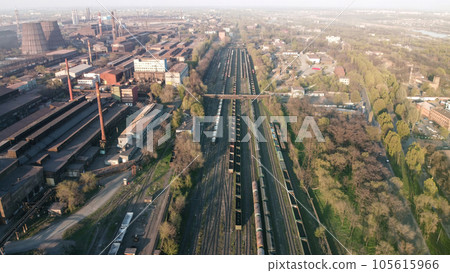 Aerial Top view to railway cylindrical tank shipping containers Rail. Striped creative transport industry representation. railroads and freight trains to transport cargo 105615966