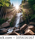 Beautiful waterfall in the forest with sun rays and lens flare 105616167