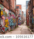 Street in an old city - colorful graffiti on the walls 105616177