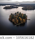 Aerial view of small island in the middle of lake - beautiful autumn landscape 105616182