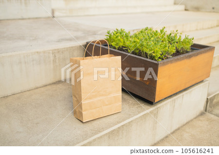 Blank brown paper bag for identity mock up, outside. Mockup for logo design and branding. 105616241