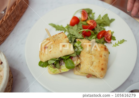 Chicken and spinach sandwiches and fresh vegetable salad. Healthy diet food concept. for breakfast or lunch. Vegetarian food. Vegan menu. Long banner format.  105616279