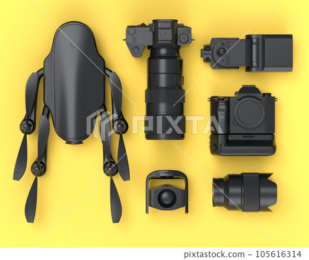 Top view of monochrome designer workspace and photography gear on yellow Top view of monochrome designer workspace and photography gear on yellow 105616314