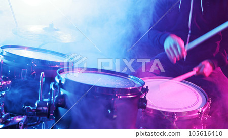 Drummer Playing on Drums Assembly. 105616410