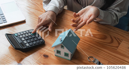 Real estate agent to his discussion and consult about house contracts client after signing contract, concept for real estate, moving home or renting property Real estate agent to his discussion and consult about house contracts client after signing contract, concept for real estate, moving home or renting property 105620486