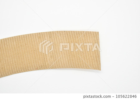 closeup brown paper cardboard texture on white background closeup brown paper cardboard texture on white background 105622846