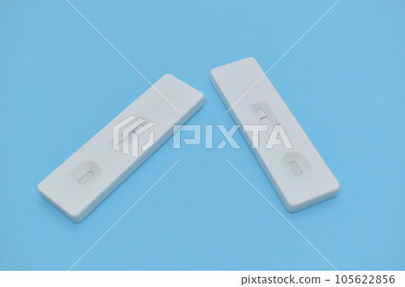 covid test kit on blue background covid test kit on blue background 105622856