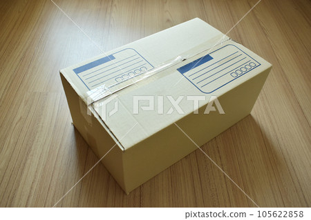 brown post box packaging put on wood floor brown post box packaging put on wood floor 105622858