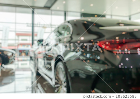 new cars in showroom interior blurred abstract background new cars in showroom interior blurred abstract background 105623583