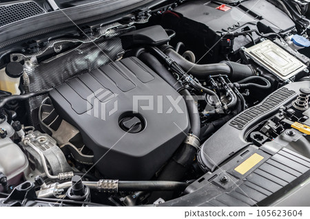 modern car engine under hood close up detail modern car engine under hood close up detail 105623604