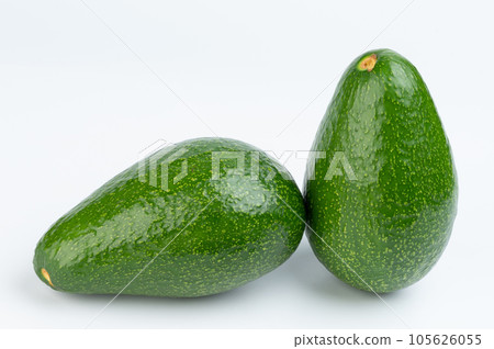 Pair of green avocados Pair of green avocados 105626055