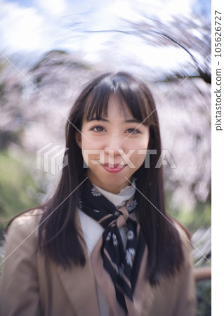 young woman in casual coat young woman in casual coat 105626727