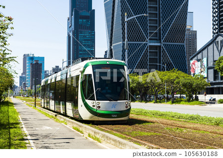 View of circular light rail train and the metropolitan building in Kaohsiung, Taiwan. The Circular Light Rail System in Kaohsiung is the first in Taiwan. 105630188