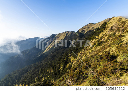 Layers of magnificent mountains landscape in Hehuanshan of Nantou, Taiwan. Taroko National Park is one of Taiwan's most popular tourist attractions. Layers of magnificent mountains landscape in Hehuanshan of Nantou, Taiwan. Taroko National Park is one of Taiwan's most popular tourist attractions. 105630612