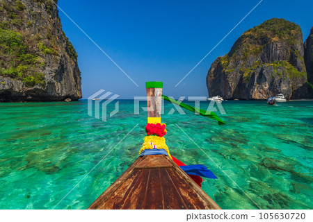 Traditional longtail boat in Maya bay on Koh Phi Phi Leh Island, Krabi, Thailand Traditional longtail boat in Maya bay on Koh Phi Phi Leh Island, Krabi, Thailand 105630720