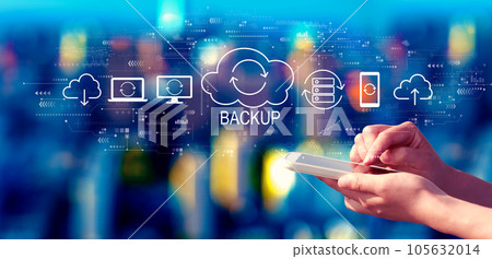 Backup concept with person using a smartphone at night 105632014
