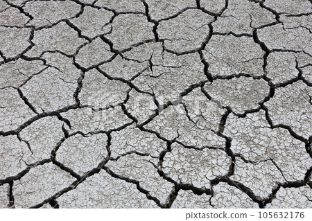 Image of drought and water shortage (cracked rice field) Image of drought and water shortage (cracked rice field) 105632176