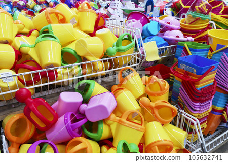 Plastic beach toys for sale in a toys shop. 105632741