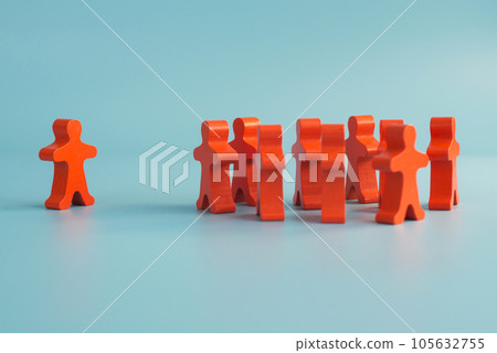 Wooden figurines of a team and a separate person or opinion. Wooden figurines of a team and a separate person or opinion. 105632755