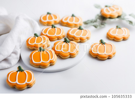 Homemade pumpkin-shaped cookies, a Halloween treat. AI. High quality photo 105635333
