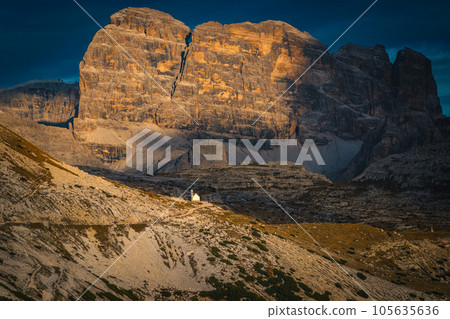 Stunning cliffs and walls at sunset in the Dolomites, Italy Stunning cliffs and walls at sunset in the Dolomites, Italy 105635636