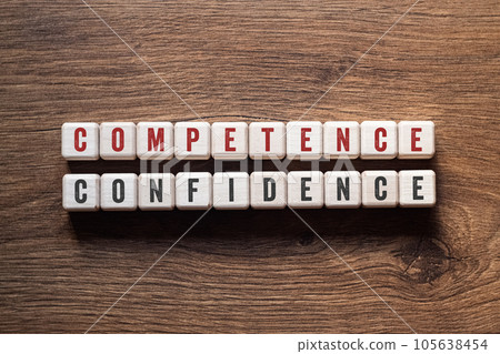 Competence confidence - word concept on building blocks, text 105638454