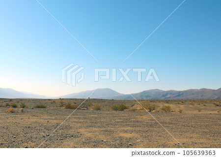 Silhouettes of mountains on a hot sunny day. Nature of the United States. Silhouettes of mountains on a hot sunny day. Nature of the United States. 105639363