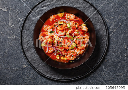 mexican shrimp cocktail salad in a bowl, top view mexican shrimp cocktail salad in a bowl, top view 105642095