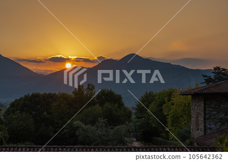 A landscape of the countryside near Iseo Lake at sunrise, Italy A landscape of the countryside near Iseo Lake at sunrise, Italy 105642362