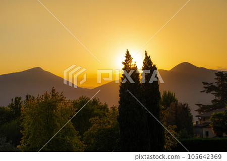 A landscape of the countryside near Iseo Lake at sunrise, Italy A landscape of the countryside near Iseo Lake at sunrise, Italy 105642369