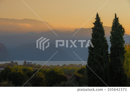 A landscape of the countryside near Iseo Lake at sunrise, Italy A landscape of the countryside near Iseo Lake at sunrise, Italy 105642371