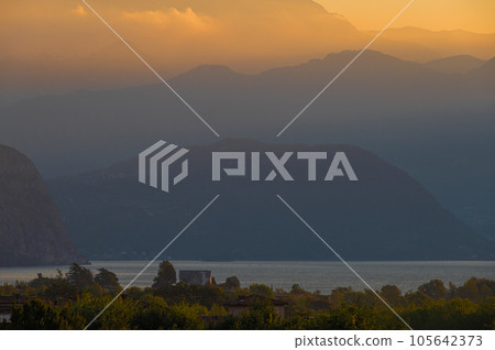 A landscape of the countryside near Iseo Lake at sunrise, Italy A landscape of the countryside near Iseo Lake at sunrise, Italy 105642373