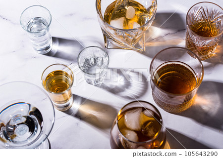 Assortment of various strong alcohol drinks 105643290