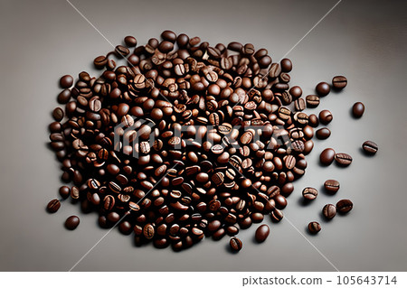 Handful fresh roasted coffee beans isolated on gray background, product and marketing presentation. Handful fresh roasted coffee beans isolated on gray background, product and marketing presentation. 105643714