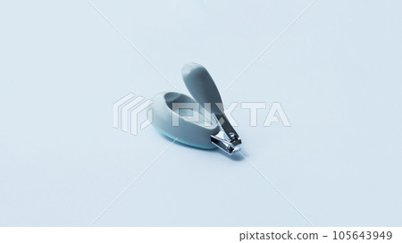Small gray fancy nail clipper isolated on white for baby or kid. Small gray fancy nail clipper isolated on white for baby or kid. 105643949