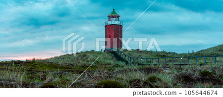 Panorama landscape on Sylt island with red bricks lighthouse on top of the hill Panorama landscape on Sylt island with red bricks lighthouse on top of the hill 105644674