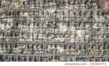 Ancient ruins Thom Bayon temple - famous Cambodian landmark, Angkor Wat complex of temples. Siem Reap, Cambodia. Ancient ruins Thom Bayon temple - famous Cambodian landmark, Angkor Wat complex of temples. Siem Reap, Cambodia. 105644755