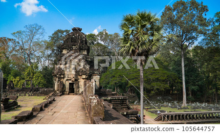 Ancient ruins Thom Bayon temple - famous Cambodian landmark, Angkor Wat complex of temples. Siem Reap, Cambodia. Ancient ruins Thom Bayon temple - famous Cambodian landmark, Angkor Wat complex of temples. Siem Reap, Cambodia. 105644757