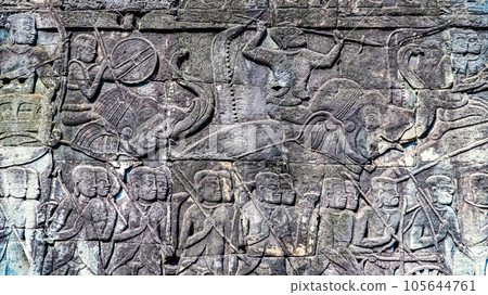 Ancient ruins Thom Bayon temple - famous Cambodian landmark, Angkor Wat complex of temples. Siem Reap, Cambodia. Ancient ruins Thom Bayon temple - famous Cambodian landmark, Angkor Wat complex of temples. Siem Reap, Cambodia. 105644761