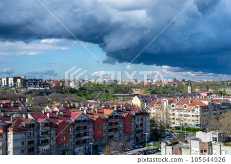 Super cell stormy sky above a city quarter Super cell stormy sky above a city quarter 105644926