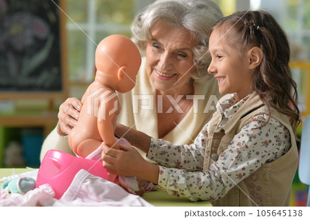 Grandmother and child play Grandmother and child play 105645138