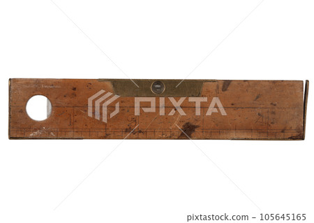 Antique carpenter's boxwood 8 inch ruler with spirit level from 19th century isolated on white. Antique carpenter's boxwood 8 inch ruler with spirit level from 19th century isolated on white. 105645165