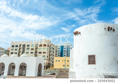 Al-Balad old town fortress remains with modern buildings, Jeddah, Saudi Arabia 105645602